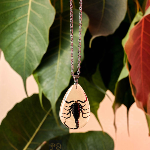 Genuine Scorpion Necklace Glow in the Dark with Purple Frangipani Beads |  Grassy River Trading
