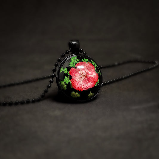 Shadowed Bloom: Red Daisy Pendant